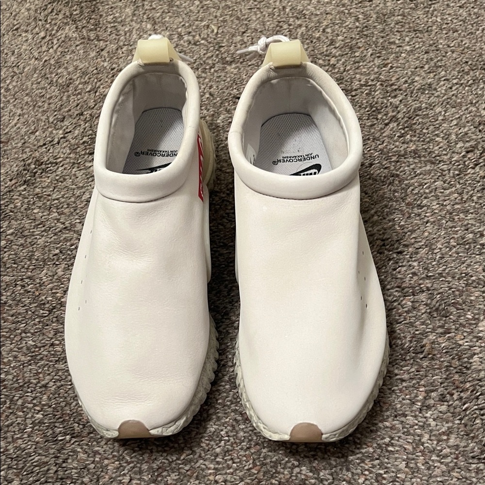 Nike White Slip-On Sneakers